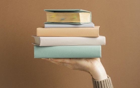 front view composition with different books dest